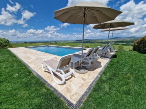 Villa I Cipressini piscina riscaldata spa Toscana